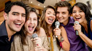 Barangay fiesta with outdoor videoke setup powered by LaSing Karaoke